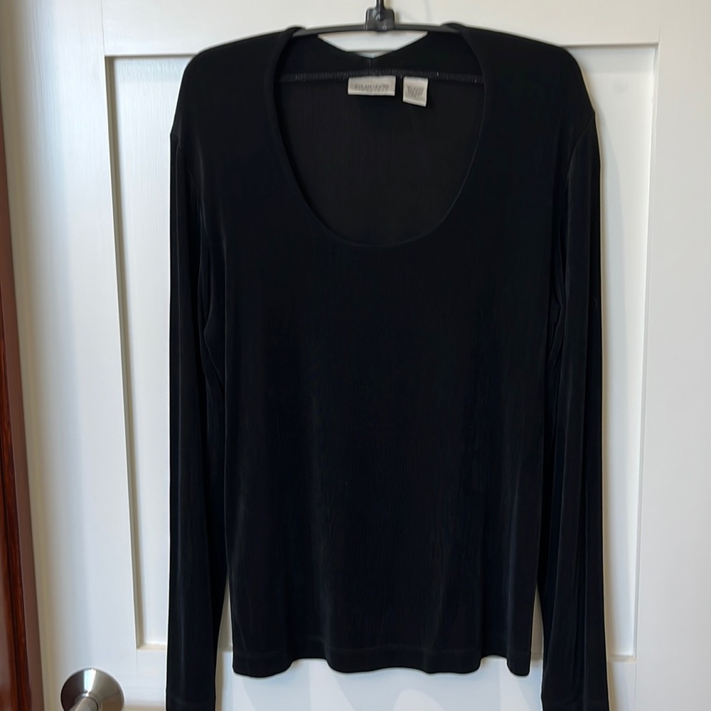 Chico’s Size1 Travelers long sleeved black blouse.